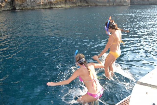  Jumping into the water with glasses